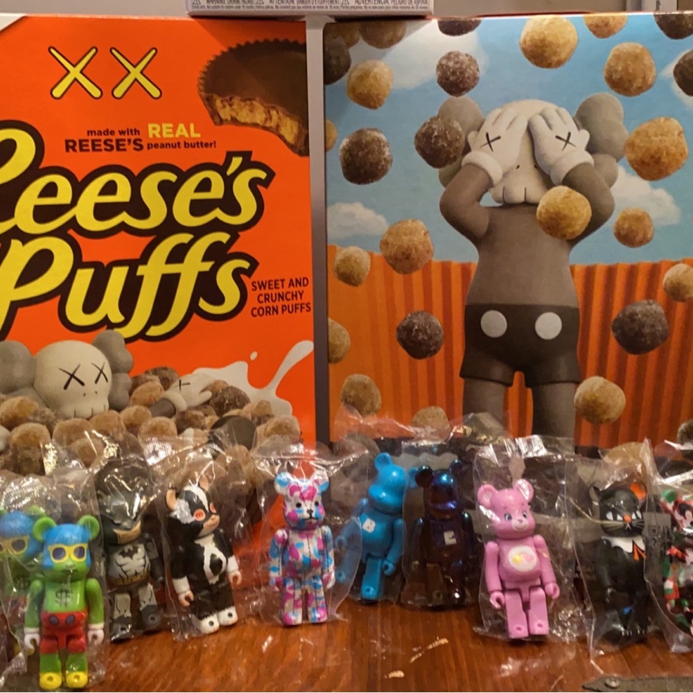 Bearbricks and Kaws Reesie’s puffs.